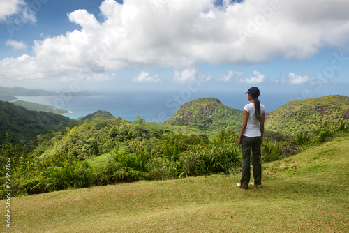 Young woman enjoying the view over rainforests