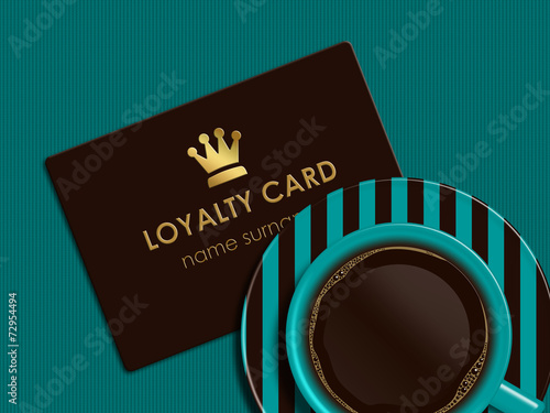 coffee with loyalty card lying on tablecloth