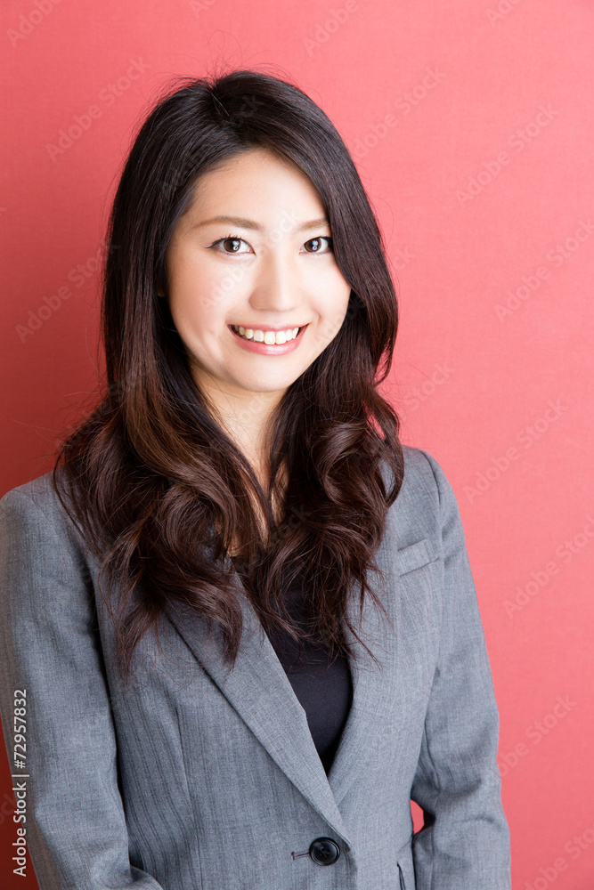 portrait of asian businesswoman on red background portrait of asian businesswoman on red background