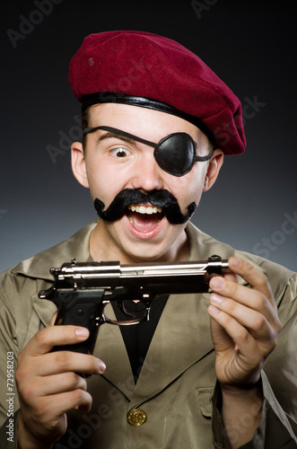 Funny soldier in military concept