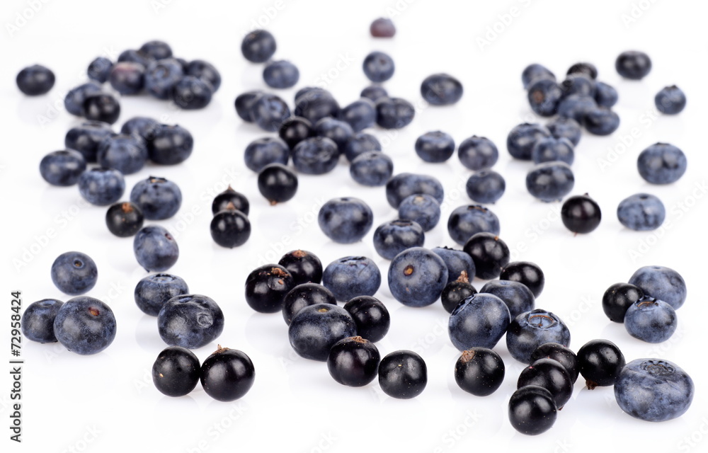 Several scattered blueberries isolated on white Several scattered blueberries isolated on white