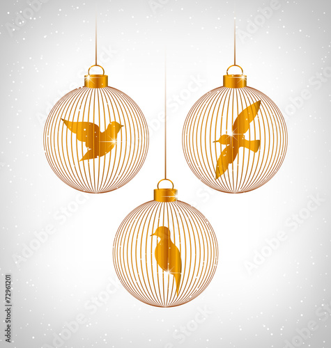 Golden Birds in golden Christmas balls in snowfall on grayscale