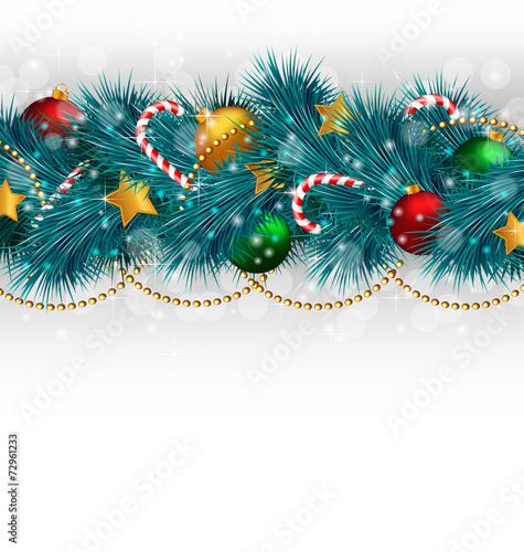 Blue Christmas tree branches with balls, candy canes, chains and