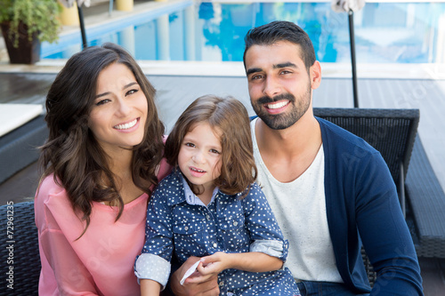 Family close to the pool