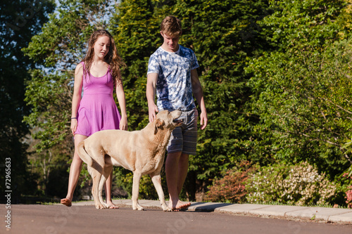 Teen Boy Girl Home Dog Relaxing