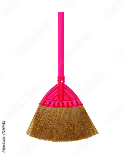 Pink broom on white background