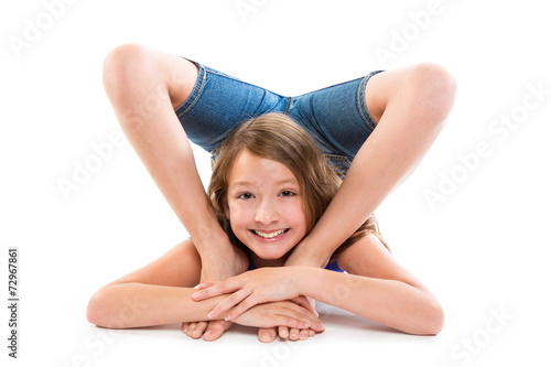 Flexible contortionist kid girl playing on white