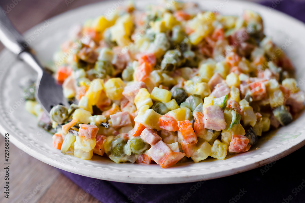 Russian traditional salad olivier with pea, new year Russian traditional salad olivier with pea, new year