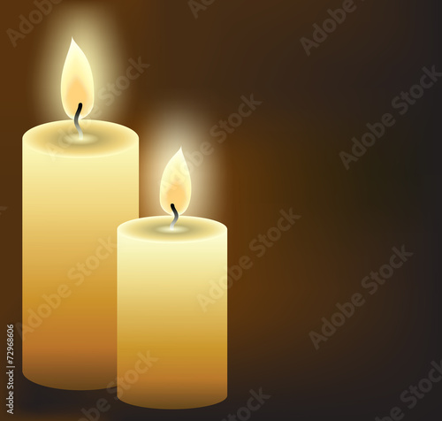 burning candles on dark background