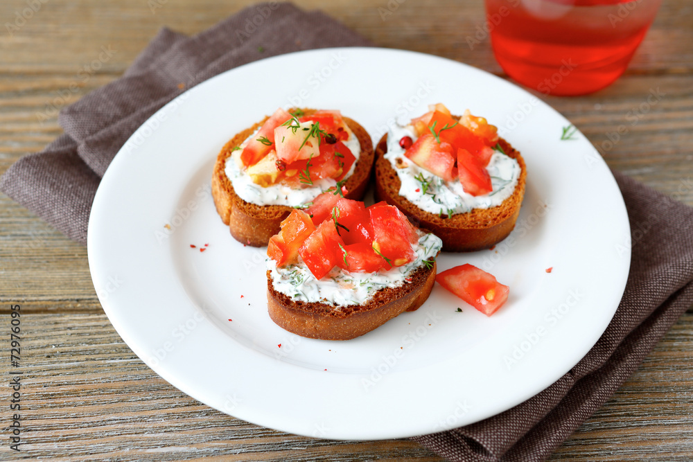 Bruschetta with tomatoes and  mayonnaise