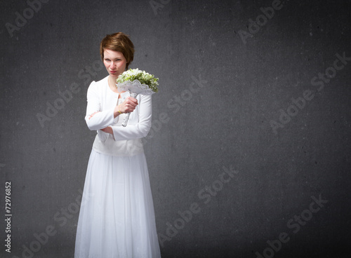 Foto bride with white dress rude umbrella gesture