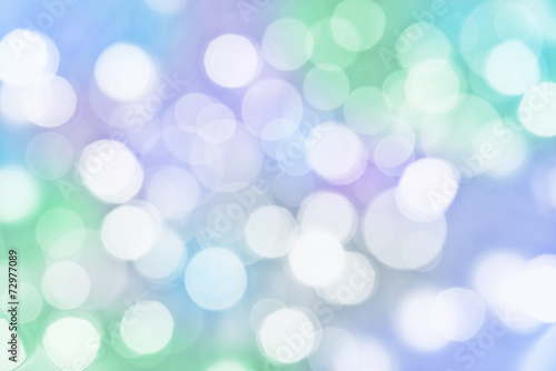 Holiday colorful background with blurred bokeh lights