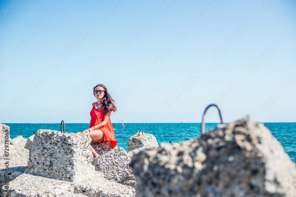 Girl on the beach at sunny day