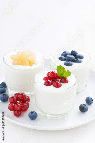 dietary product - assortment yogurt with fresh berries  vertical