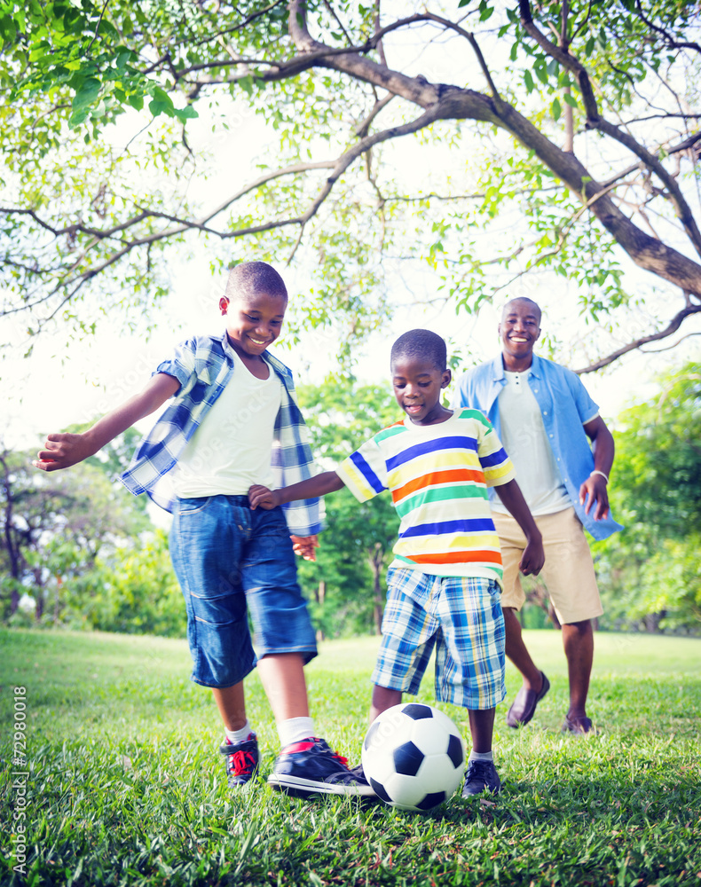 Fototapeta premium Family Father Son Bonding Sports Soccer Concepts