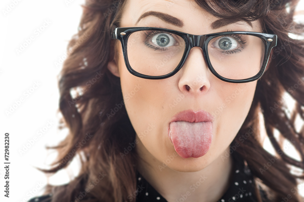 Close up woman sticking her tongue out Close up woman sticking her tongue out