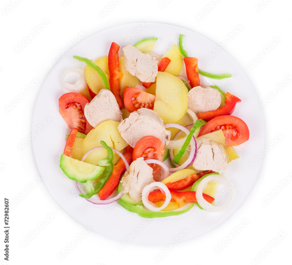 Warm meat salad with vegetables