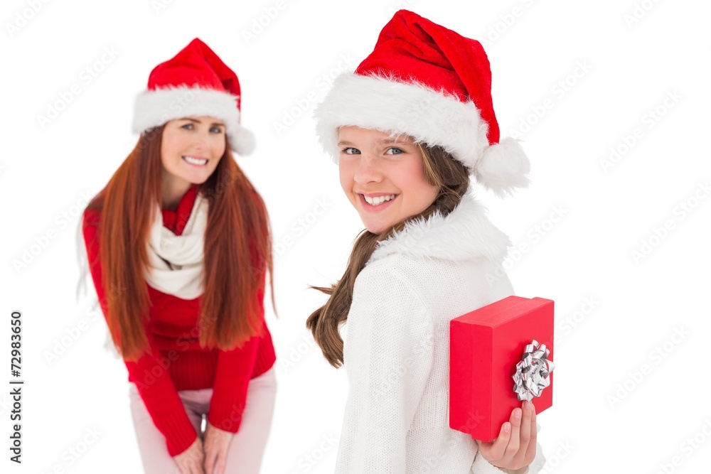 Mother and daughter with christmas gift Mother and daughter with christmas gift