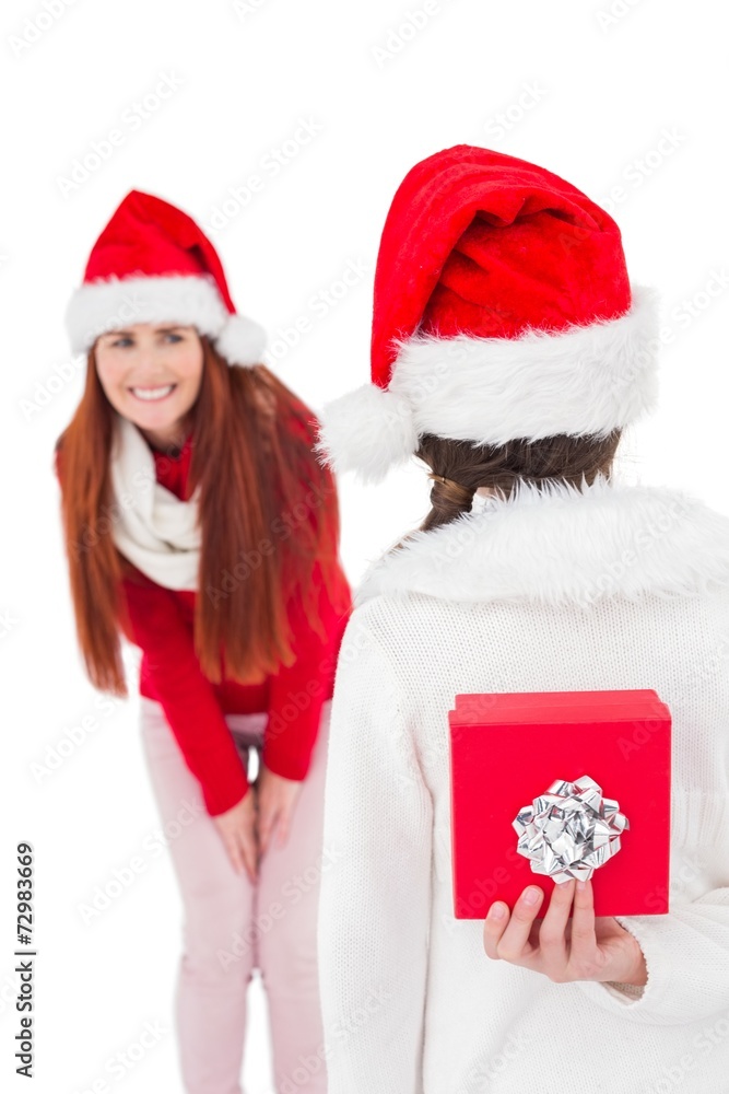 Mother and daughter with christmas gift Mother and daughter with christmas gift