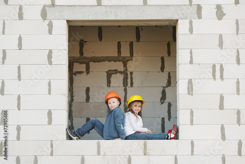 Wallpaper Mural boy and girl playing on construction site Torontodigital.ca