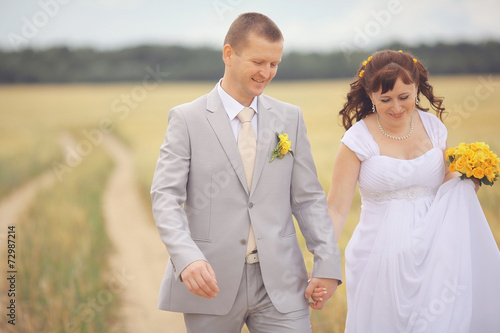 wheat field wedding bride and groom walk