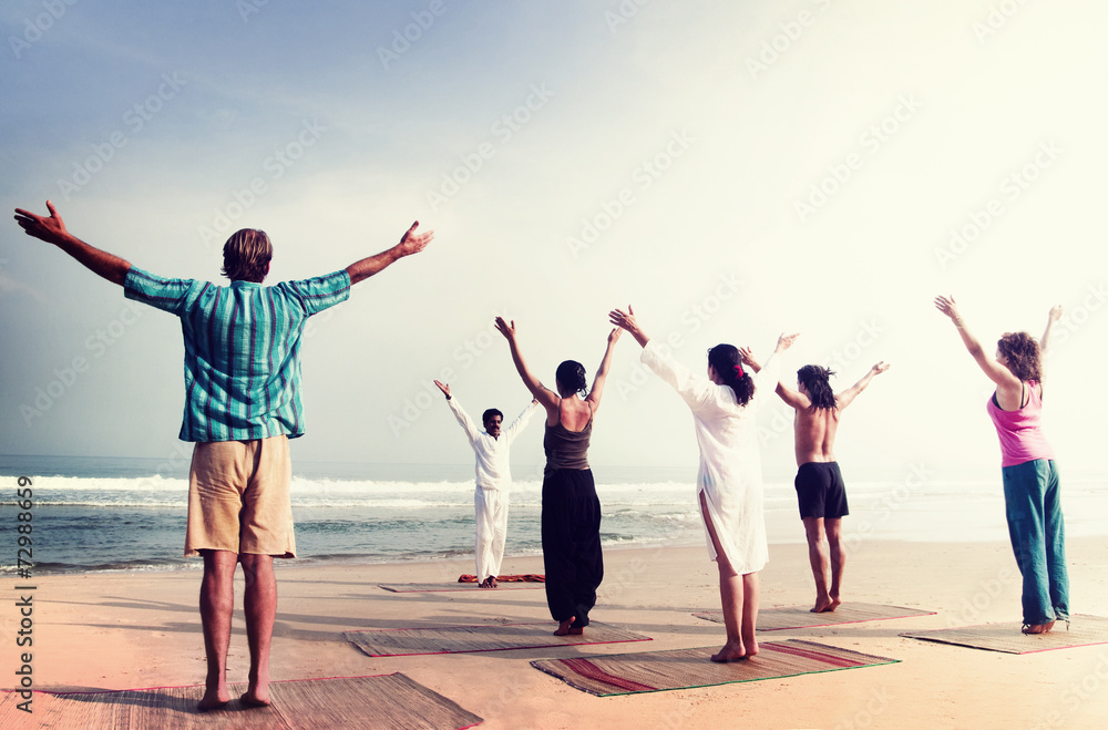 Obraz premium Yoga Wellbeing Exercise Beach Concept