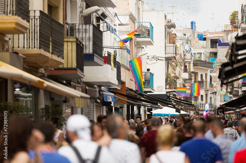 Photography Street with rainbow flags in Sitges