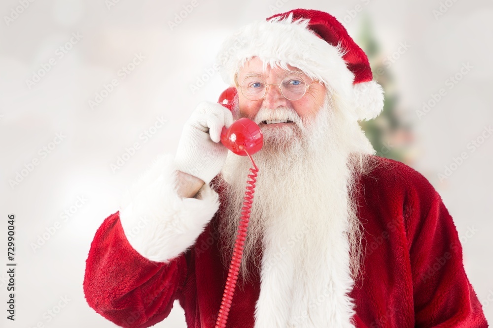 Composite image of santa claus on the phone Composite image of santa claus on the phone