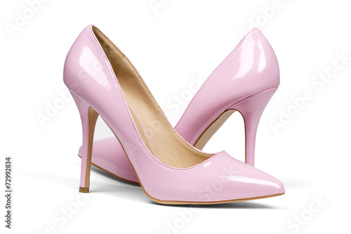 A pair of pink women's heel shoes isolated with clipping path.