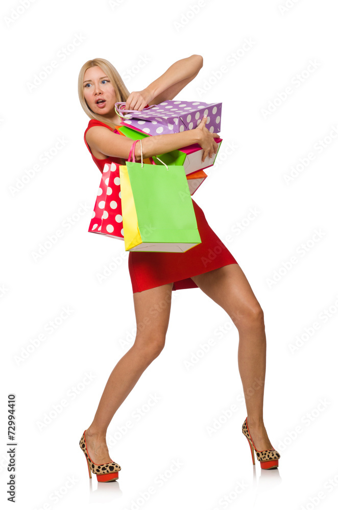 Woman with shopping bags isolated on white Woman with shopping bags isolated on white