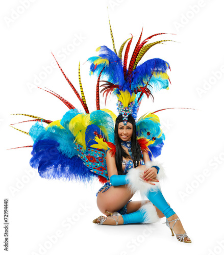 Smiling beautiful girl in a colorful carnival costume