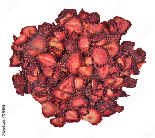 Heap of dried  strawberries on a white