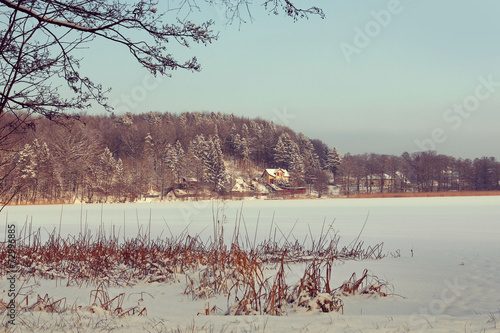 Winter landscape with frozen lake