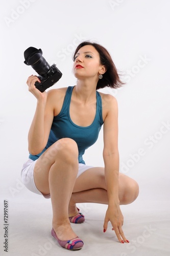 Photographer woman on work isolated white background © hayricaliskan