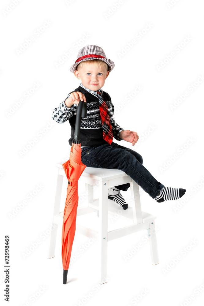 Boy with umbrella studio shot isolated on a white background Boy with umbrella studio shot isolated on a white background