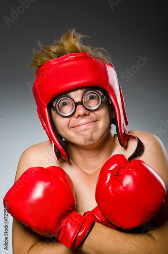 Funny boxer against dark background © Elnur