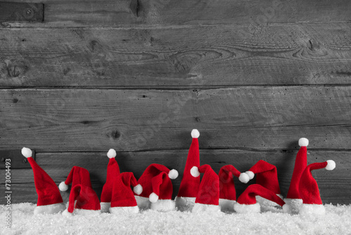 Weihnachtlicher Holz Santa Hintergrund in grau, rot und weiß