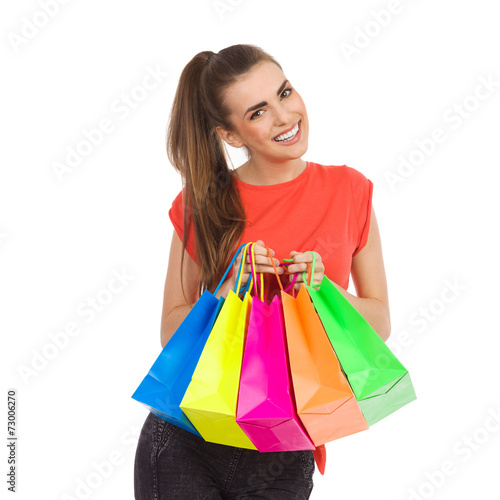 Girl with colorful shopping bags