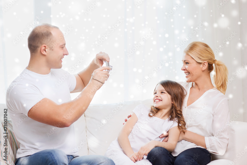 happy family with camera taking picture at home happy family with camera taking picture at home