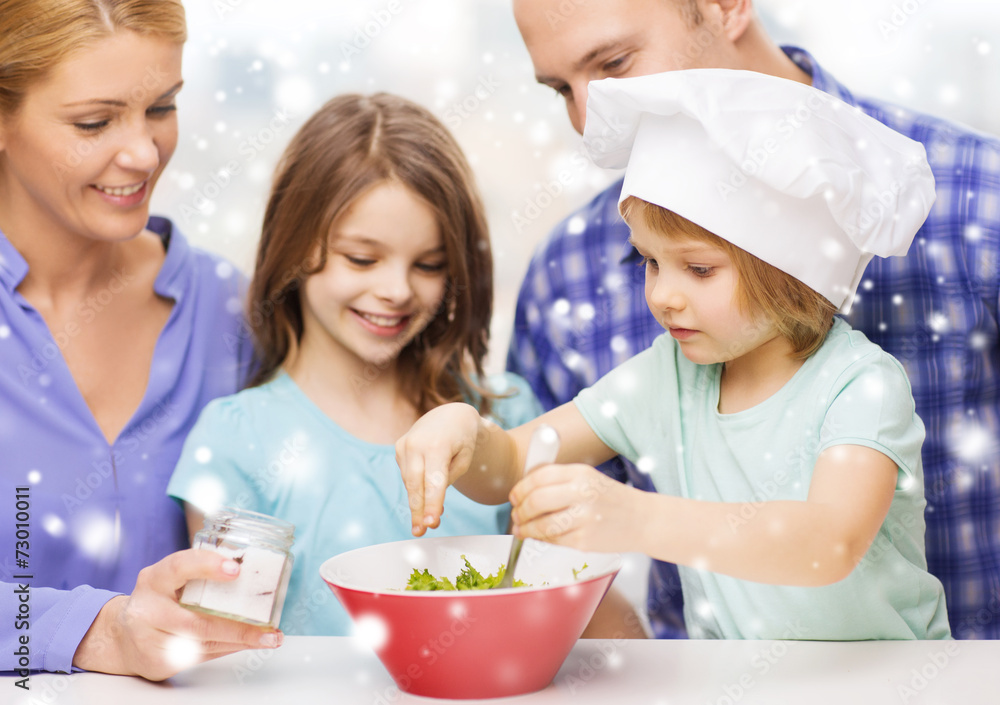 happy family with two kids making salad at home happy family with two kids making salad at home