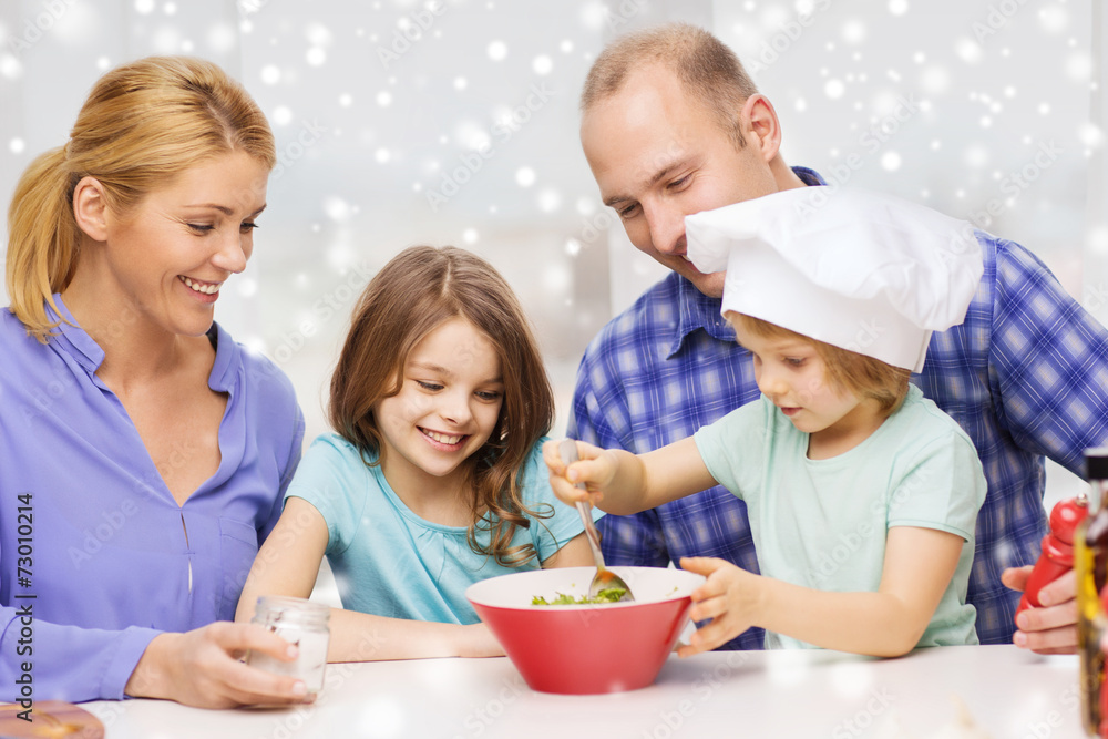 happy family with two kids making salad at home happy family with two kids making salad at home