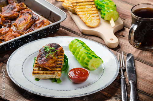 Sticky chicken with spicy sauce, toasted panini