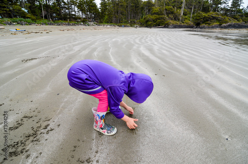 Child on the beach photo