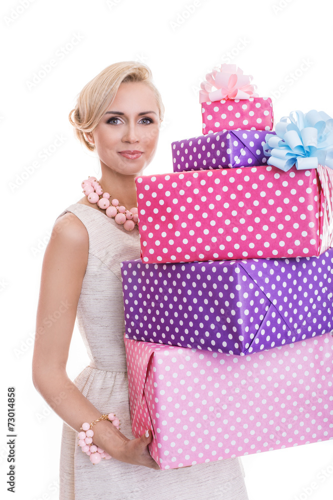 Beautiful blonde woman with a colorful gift boxes Beautiful blonde woman with a colorful gift boxes