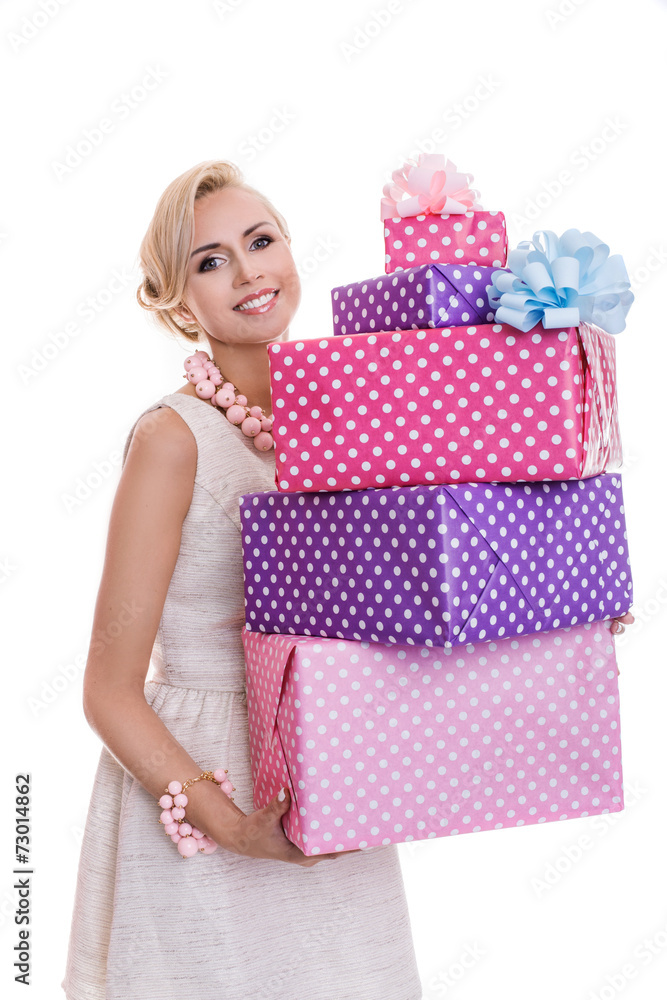 Beautiful happy woman with a colorful gift boxes Beautiful happy woman with a colorful gift boxes