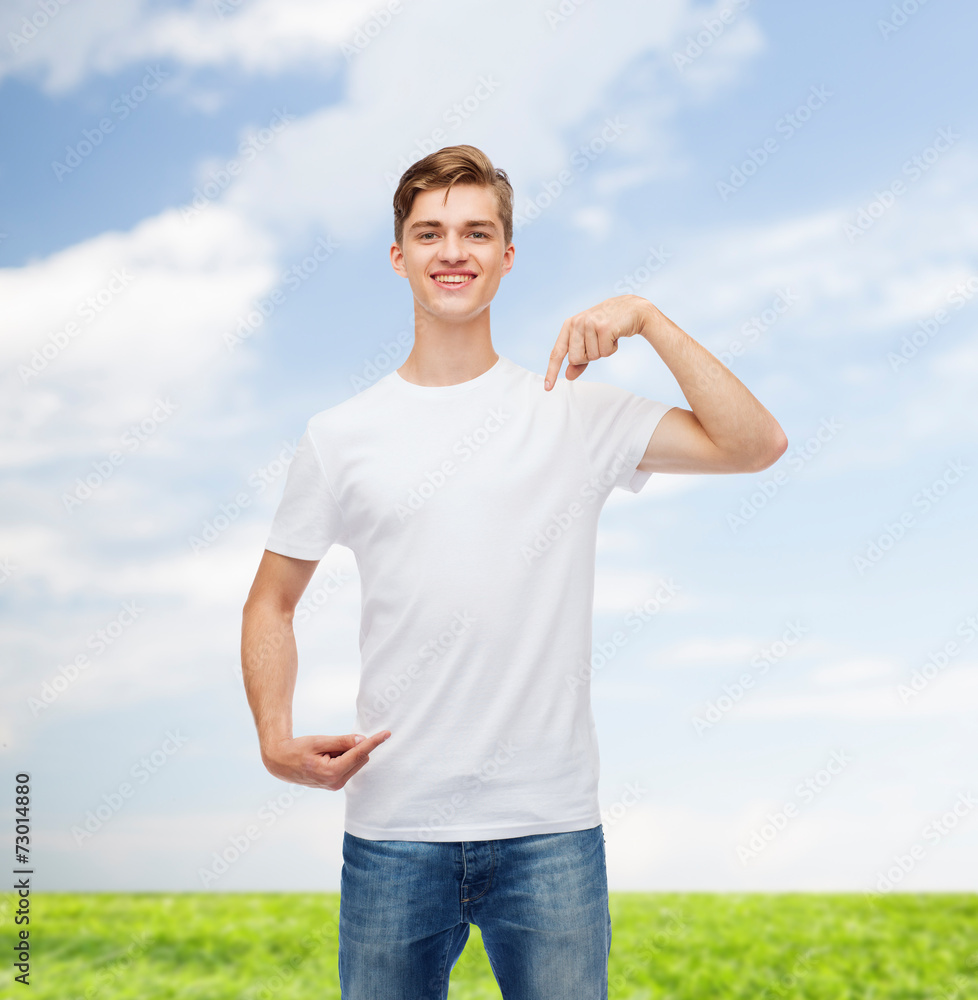 smiling young man in blank white t-shirt smiling young man in blank white t-shirt