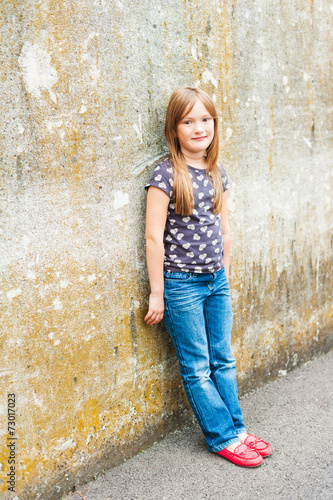Outdoor portrait of a cute little girl