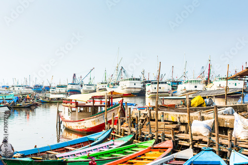 Harbour ship and boat docks in Jakarta, Indonesia photo