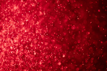 abstract bloody red background with bokeh particles