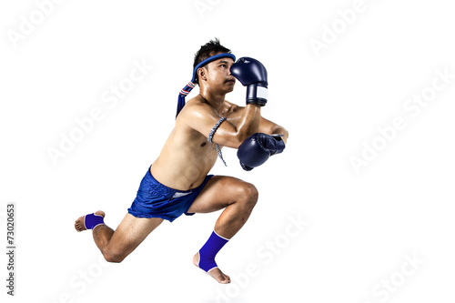 Thai boxer with thai boxing action, isolated on white background © kromkrathog